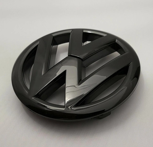 Genuine front grille emblem - front,